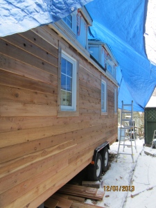 All of the siding up on the back wall.