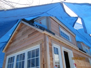Another view of the dormer and large window siding.