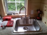 Kitchen sink and faucet in place!